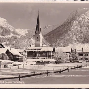 AK Oberstdorf, Stadtansicht im Winter gegen Nebelhorn, ungelaufen- datiert 1951