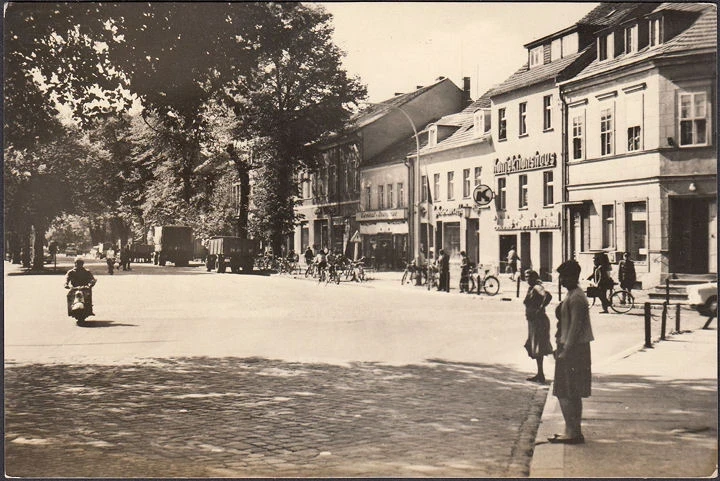 AK Lübben, Breitestraße, Konfektionshaus, Drogerie, ungelaufen