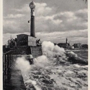 AK Warnemünde, Mole bei Sturm, gelaufen 1933